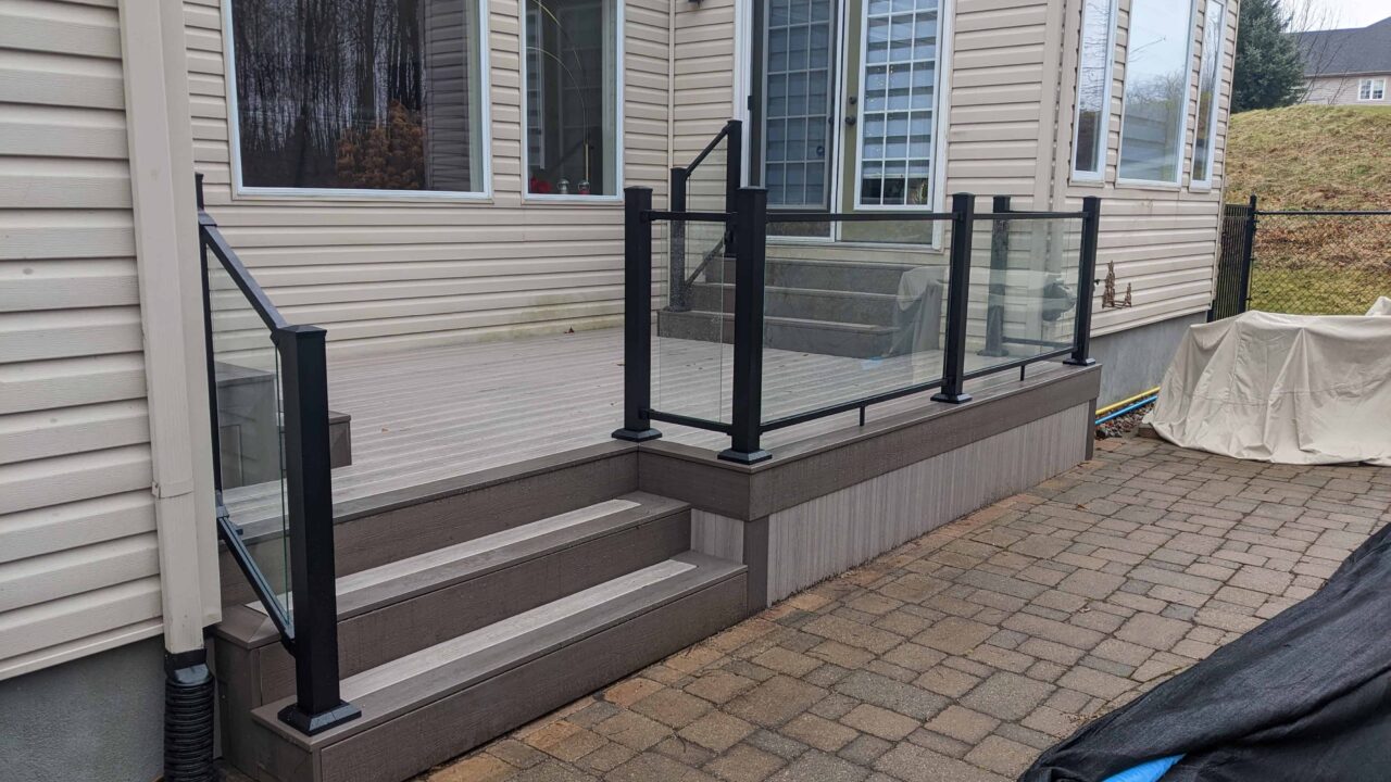Left view of Cabana Latte poolside deck with glass railing