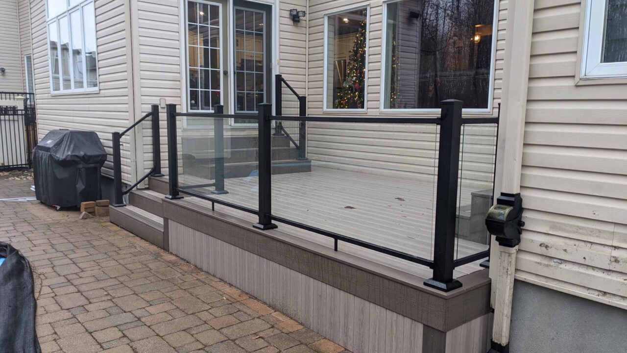Right view of Cabana Latte composite deck and Fortress glass railing