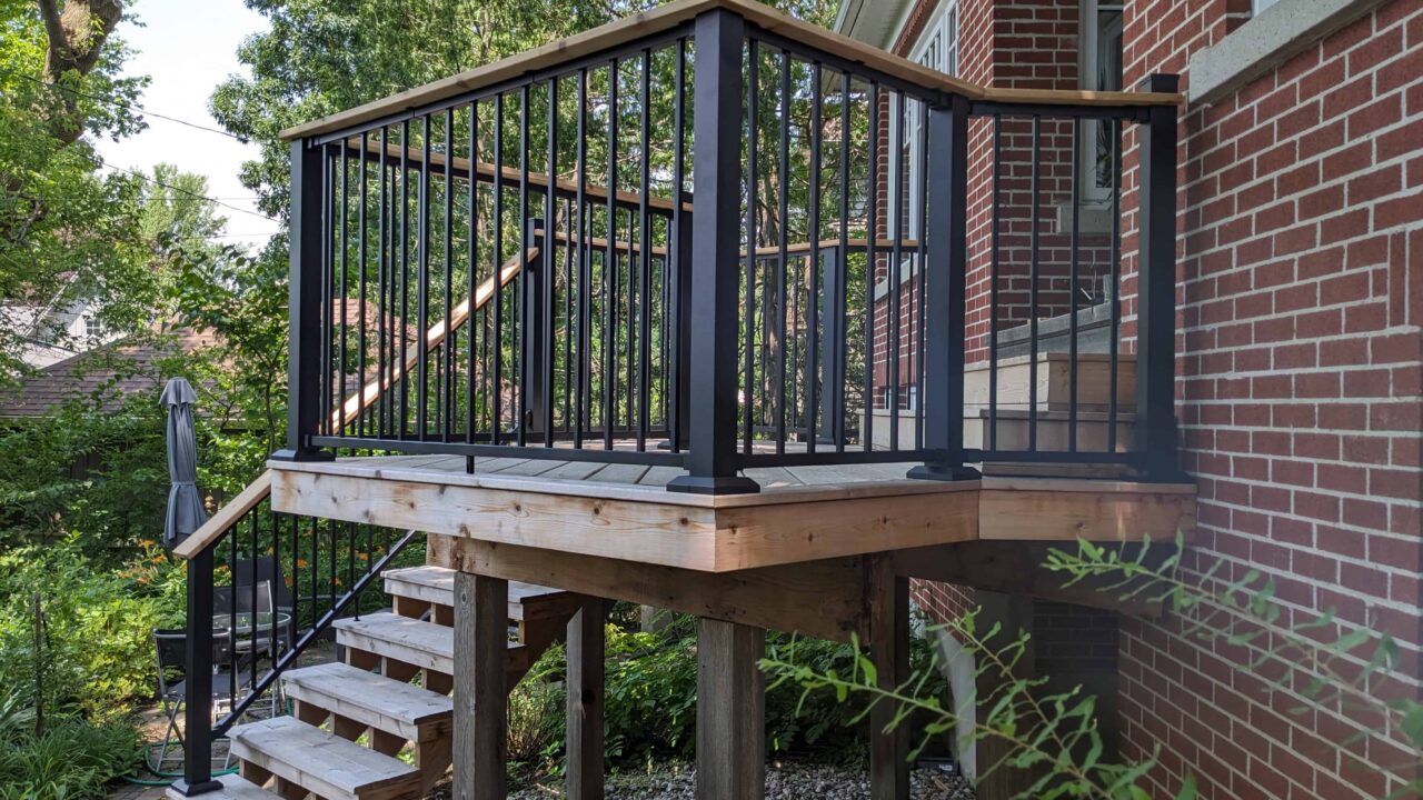 Finished Fortress black railing with cedar drink rail right view