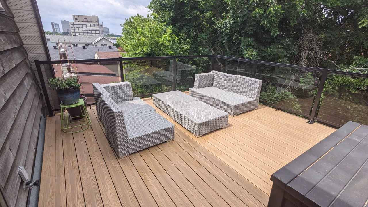 Finished Little Italy deck with Fortress Himalayan Cedar decking and black glass railing