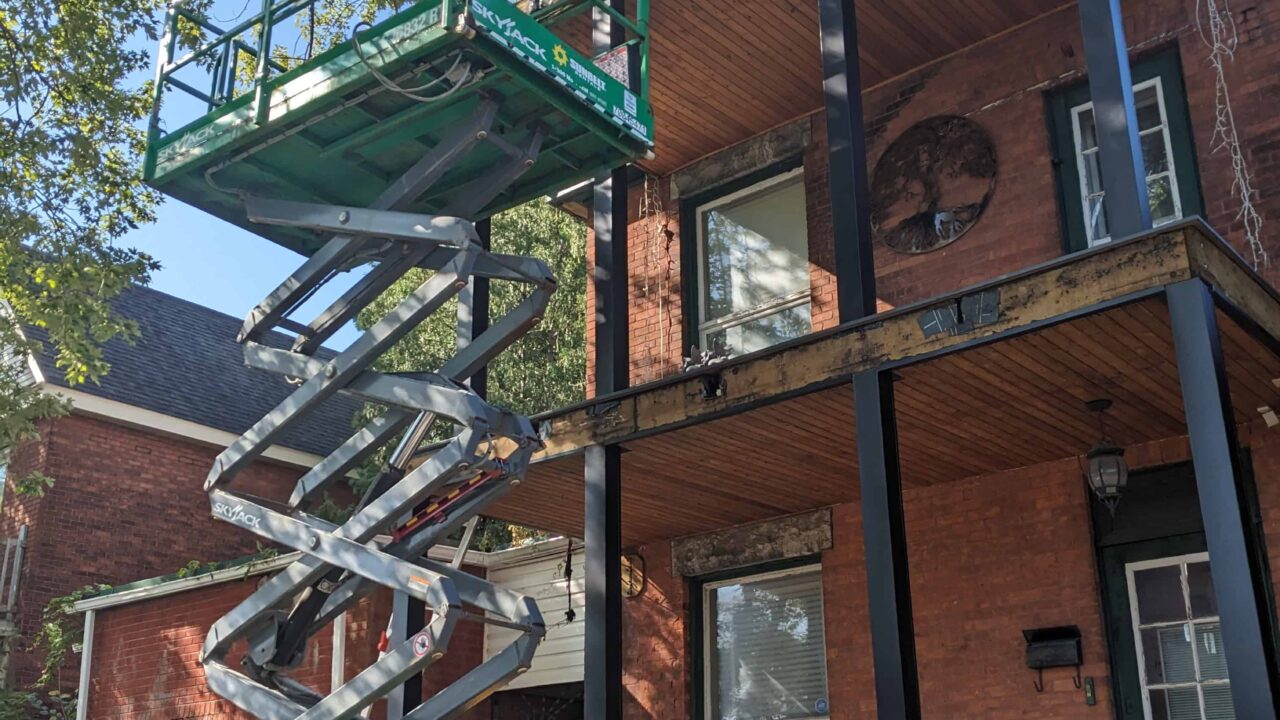 Composite cladding being installed on a multi-level deck
