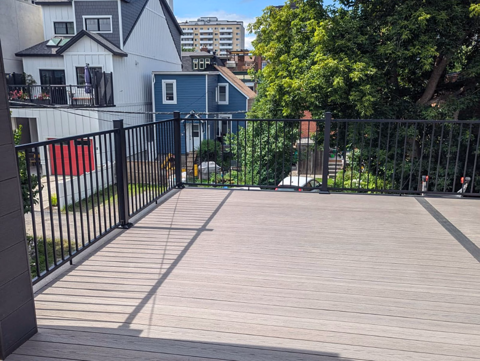 Finished rooftop deck with Fortress railing in Ottawa Golden Triangle